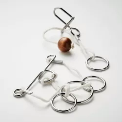 Juego rompecabezas metálicos